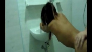Whore fucked in toilet