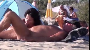 Many exhibitionists playing out on the beach together public fuck