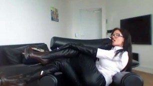 Milf In Glasses Smoking In Sexy Boots
