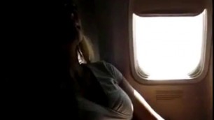 Hot MILF Girl Fingering Herself on Commercial Airplane