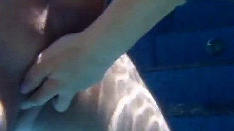 Girl pulling my cock underwater