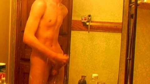 Curly-haired twink in bathroom