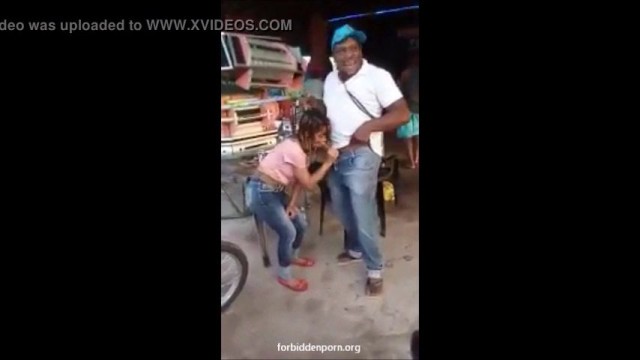 Latina girl making a blowjob at a reggaeton party