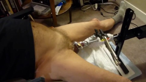 Fuck machine sounding my cock in chastity cage