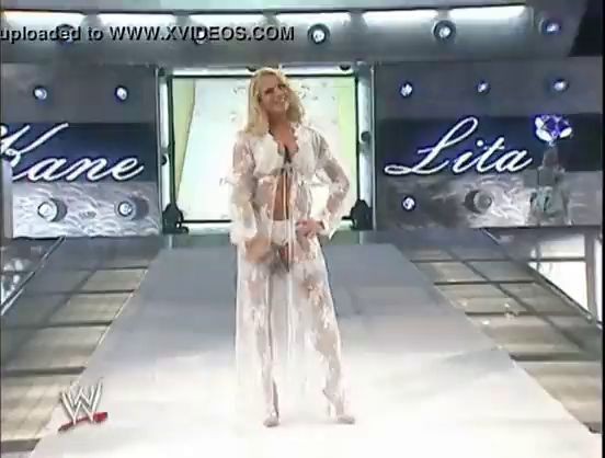 Trish Stratus walking out in white lingerie