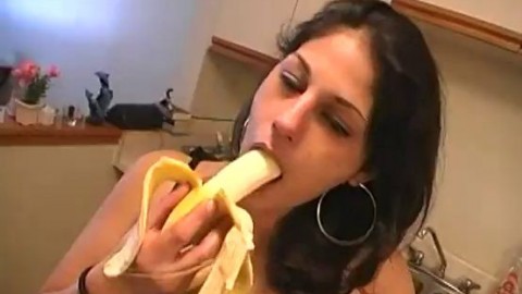 NDNgirls.com | Native American Indian girl dared to suck a large banana ends up giving big black cock blowjob in the kitchen