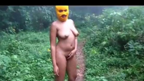 Redbone ebony taking a walk butt naked in the woods