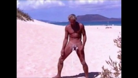 Tanned guy on beach in tiny string thong (temporarily!)