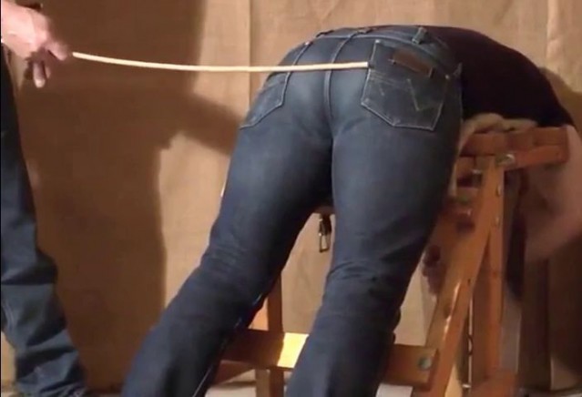 Caned over tight jeans Daddy boy