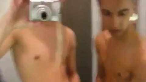 home video of 2 bfs in store fitting room wanking off