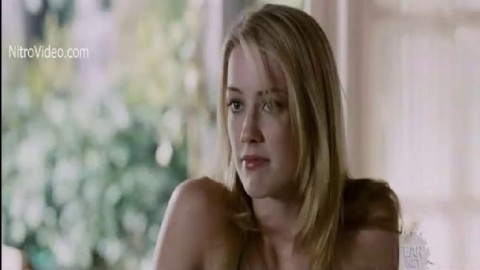 Celeb Amber Heard in tight bikini