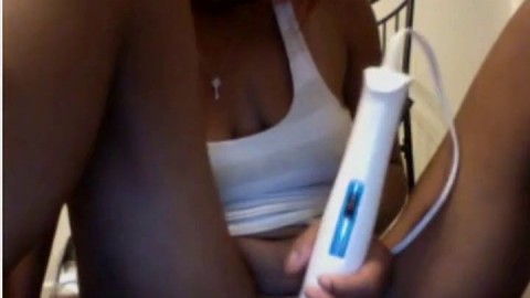 Vibrator on ebony pussy