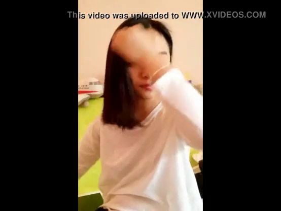 Young Asian teen showing her smooth body