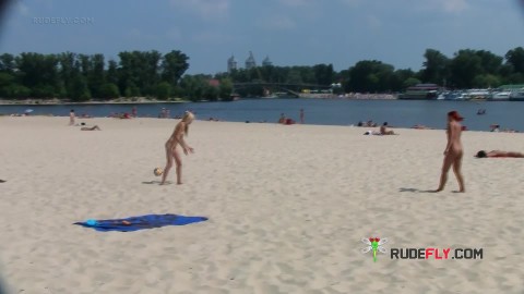 Adorable nudist teen sunbathes nude and gets secretly recorded on camera by a voyeur
