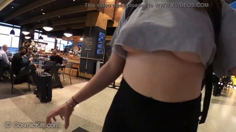 Girl walking with tits out in the airport teasing everyone