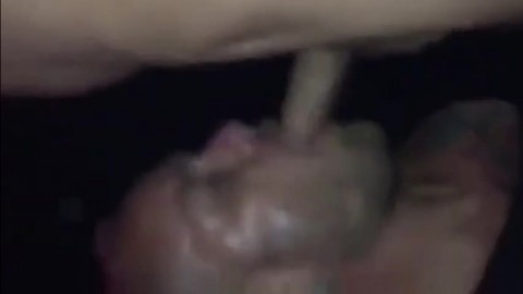 Sucking cum out of a tourist daddy in darkroom