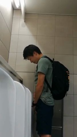 Males are pissing in the toilet 13.