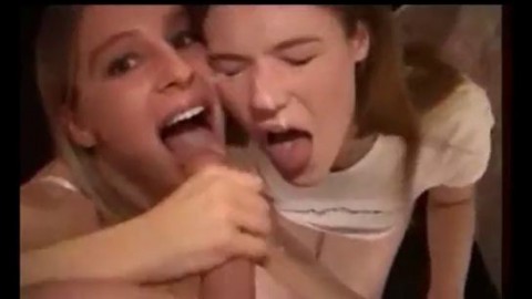 Two girls make a blowjob and kiss