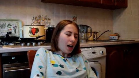 Teenie fingers to orgasm in kitchen