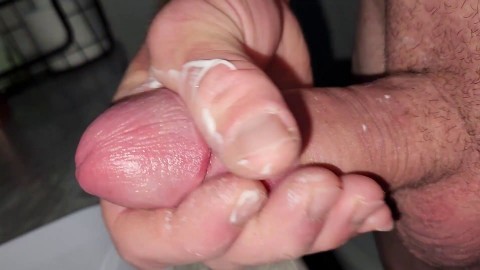 Rubbing lotion into my cock