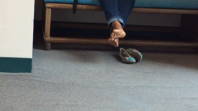 Ebony Girl Relaxing With Feet Completely Out Of Flats