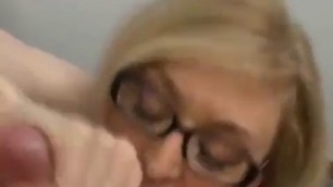 Blonde MILF in Glasses Sucking Cock
