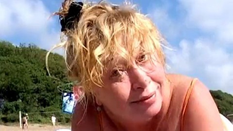 Mature woman on the beach