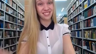 Teen blond girl in the library in a short skirt amateur