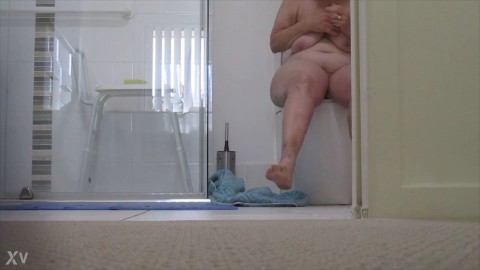Great close-up of Granny sitting naked on the toilet