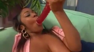 Wicked hot black chick toy fucking her sweet chocolate pussy