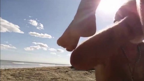 Blonde slut sucks old guys dick on the beach in Florida