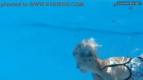 Beautiful blonde Zazie Skymm swims nude