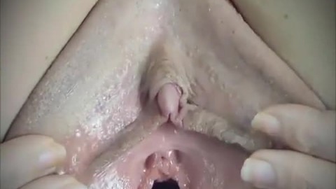 a cute blonde spreads her pussy for us