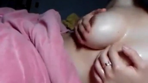 Asian girl shows & massages her great boobs