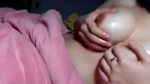 Asian girl shows & massages her great boobs