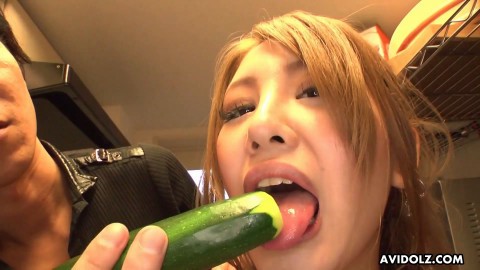 Blonde housewife Mariru Amamiya fucks with a vegetable in her hairy cunt uncensored.