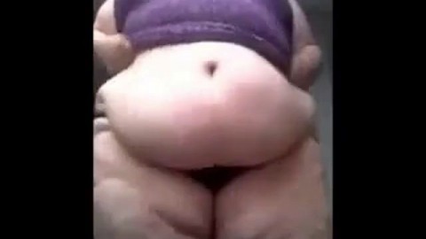 Purple-Dressed SSBBW Shows Off and Plays with Her Giant Belly