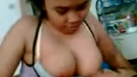 Busty Asian Babe Gives Sensual Blowjob and Titillates with Massive Boobs