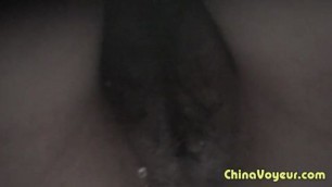 Japanese girl with hairy pussy pissing in the toilet