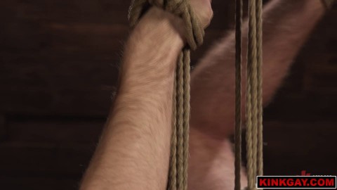 Derek Kage slaps Carter Collins all over with a crop and his dick grows harder