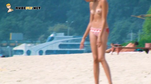 Hot young nudists secretly filmed having fun