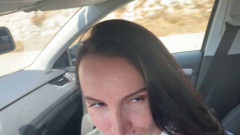 Big-Titted Brunette Sucks Driver's Cock in Car for a Mouthful of Cum