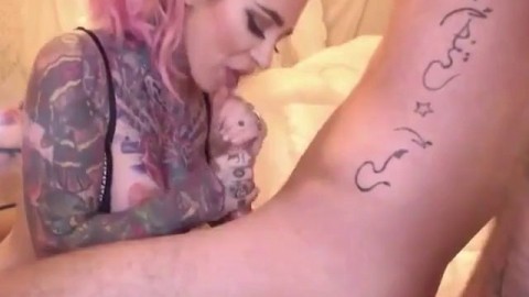 Tattooed Amateur Gives Lucky Man Intense Webcam Blowjob