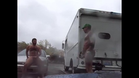 Public Rainy Stroking in a Parking Lot by Two Horny Men