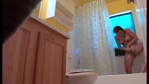 Stepdaughter 21 shaves pussy in shower (voyeur)