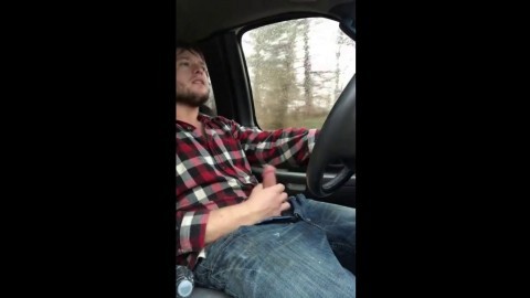 Stroking my big cock while driving