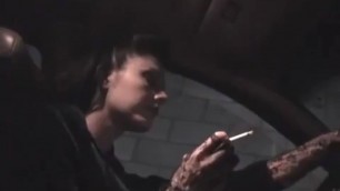 sexy brutal chick brunette erotic smokes in the car