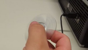 Guy spins small fidget spinner harder than any boner he can get
